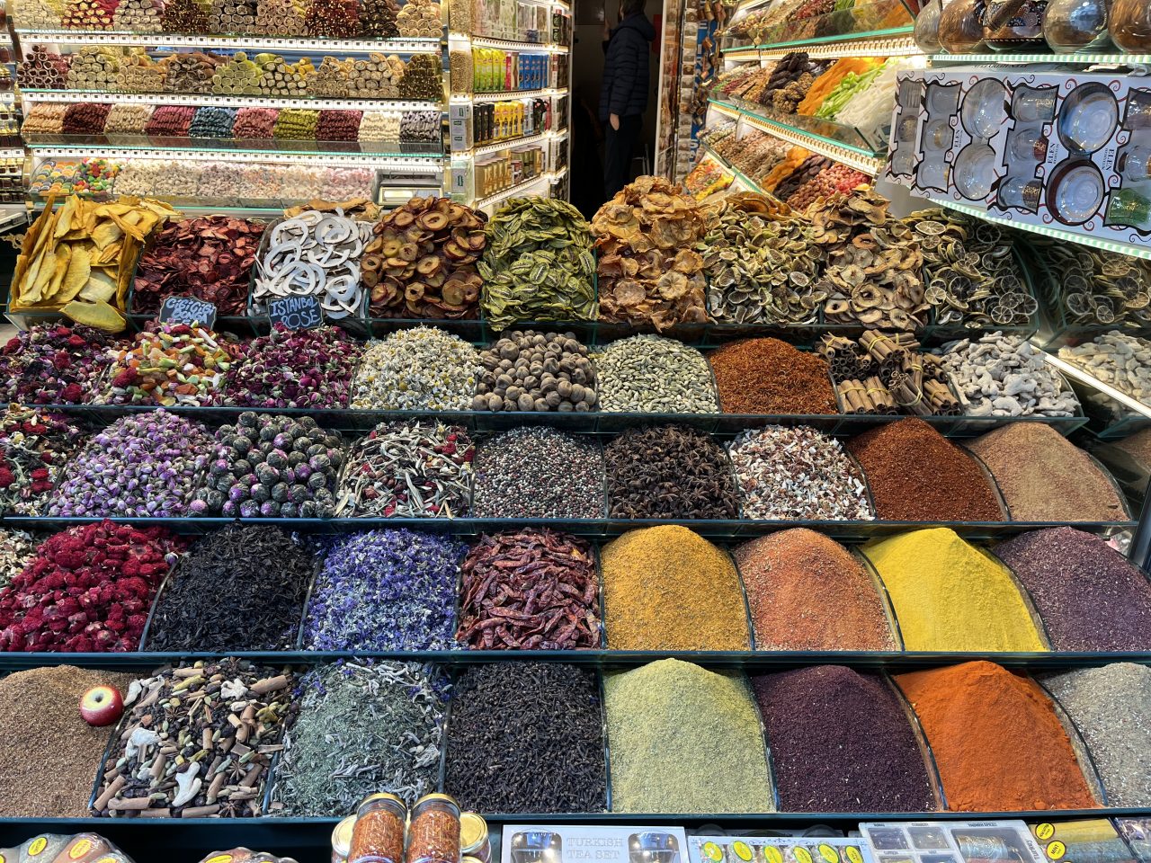 An array of spices (looks like it a market place).
