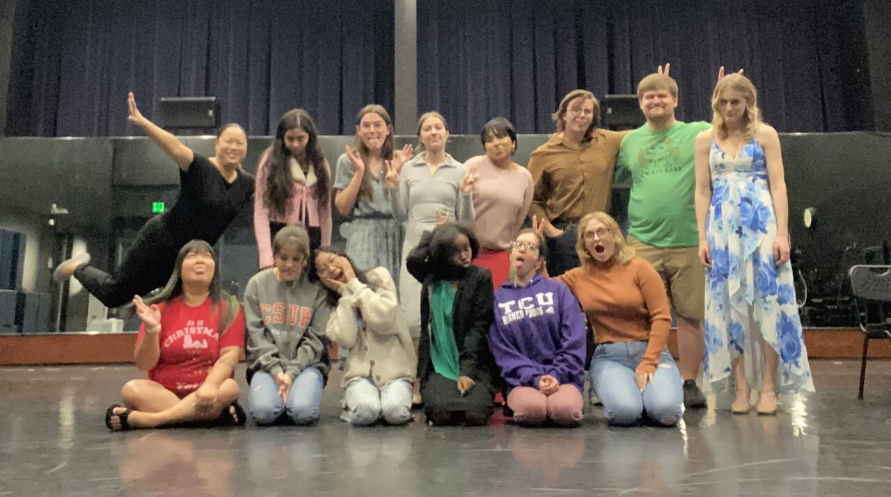 A large group pulling 'funny' faces for the camera